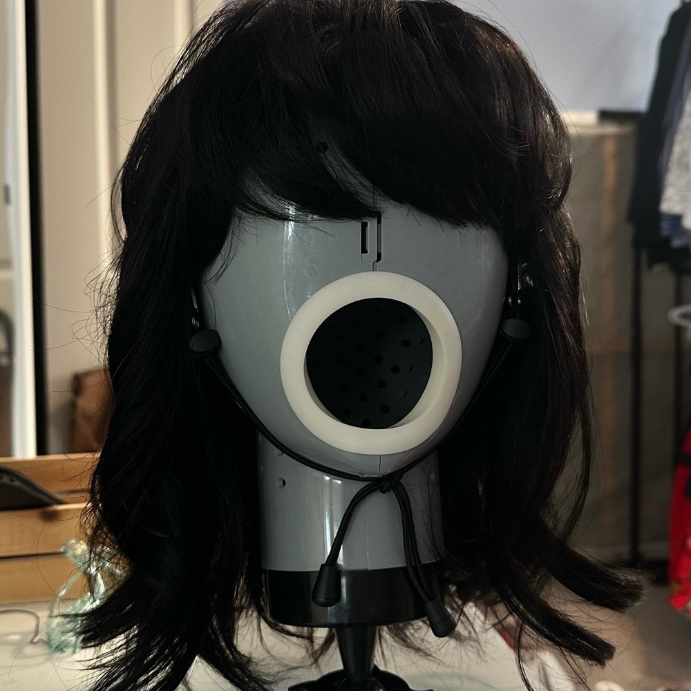 Human Hair Black Sleek Wig With Bangs freshly washed and styled. Hard cap.